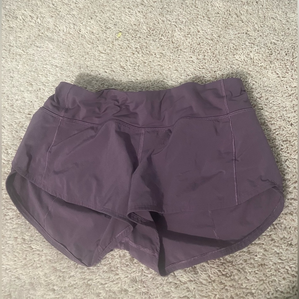 Lululemon purple speed up shorts.